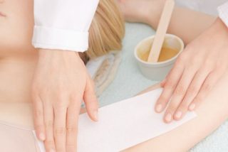 Waxing underarm with strips wax Waxing underarm with strips wax